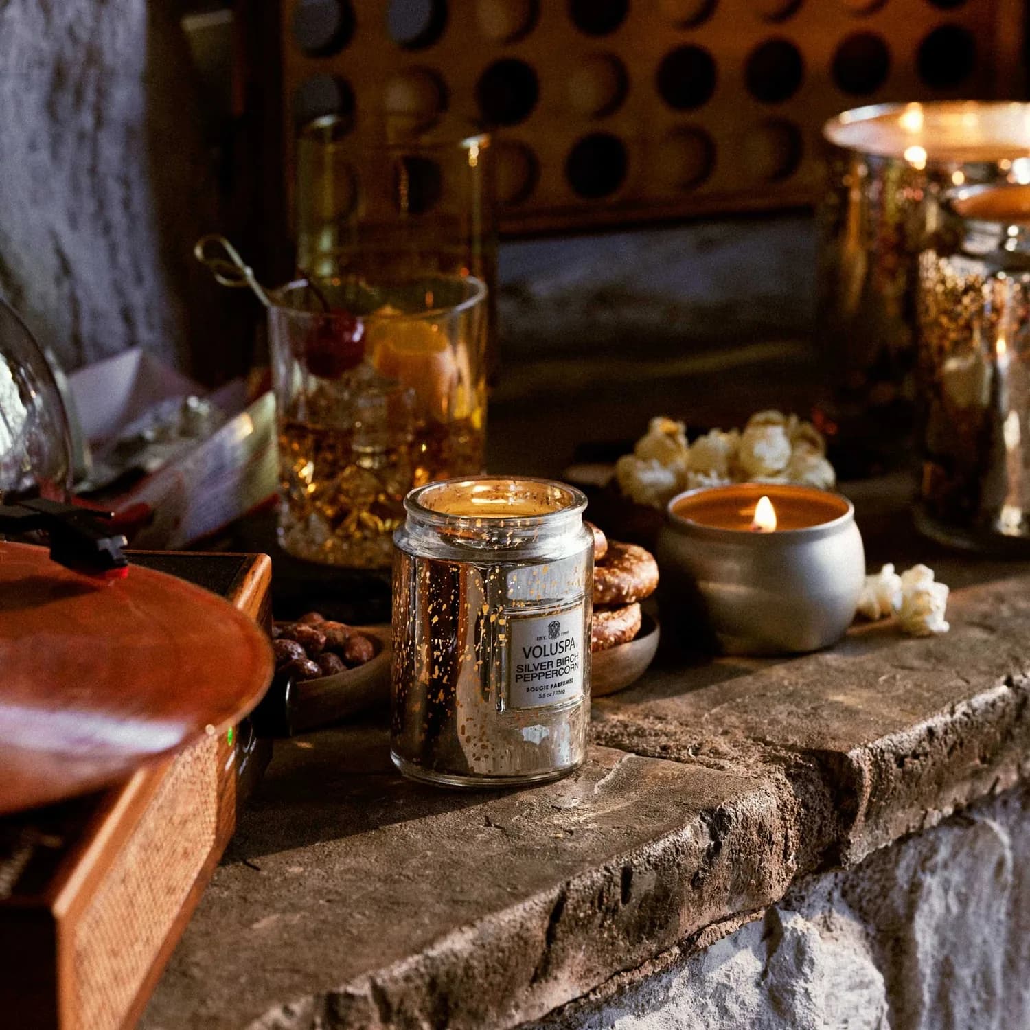 Voluspa Silver Birch Peppercorn Small Jar Candle in lifestyle scene